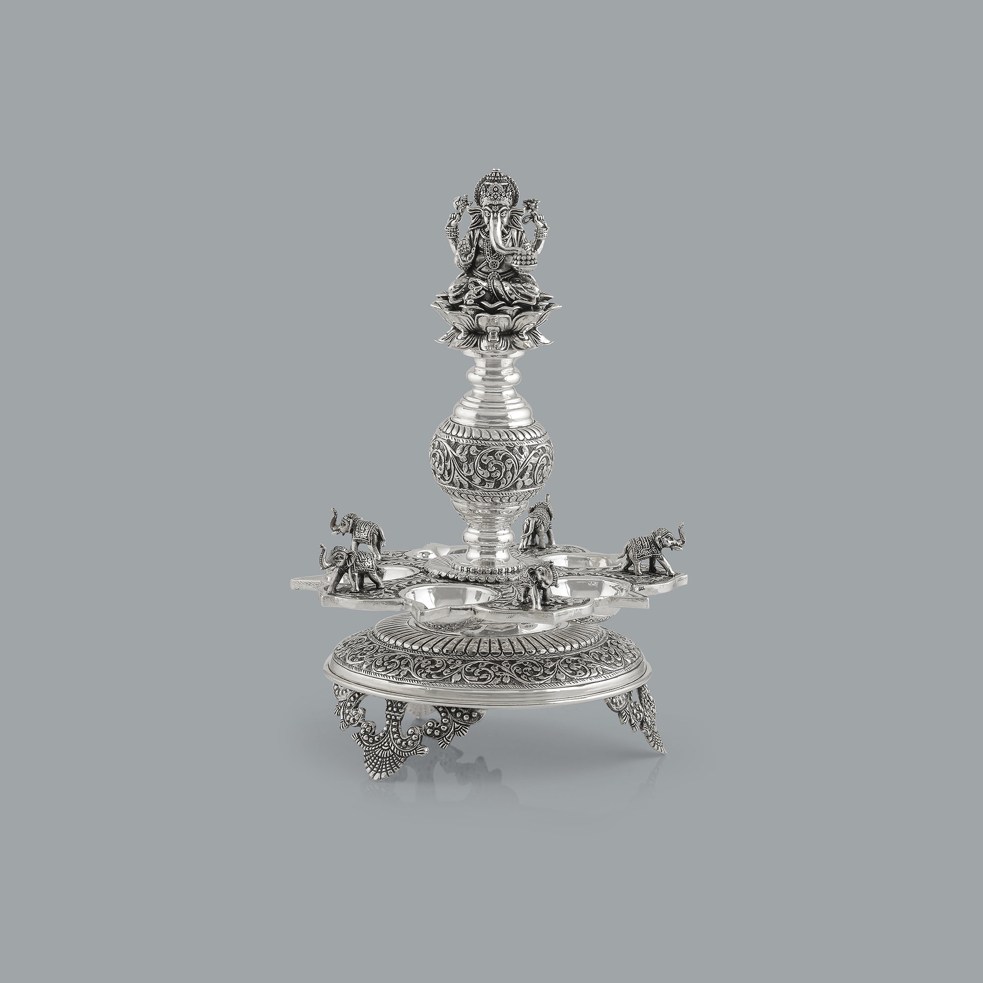 Divine Silver Diya Stand With Ganesh and Elephants