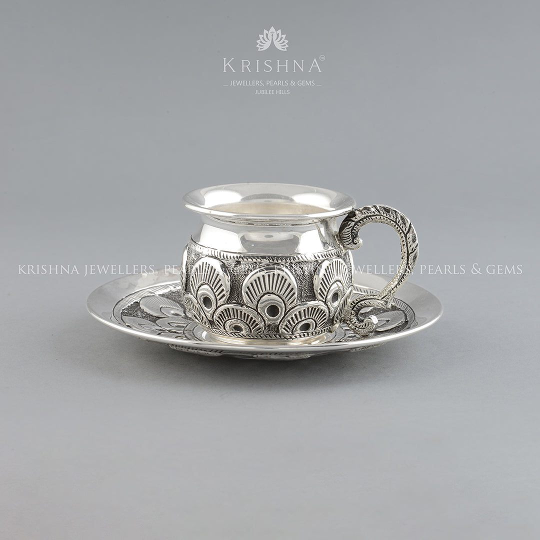 Silver Antique Tea Cup and Saucer with Peacock Feathers - Krishna Jewellers Pearls and Gems