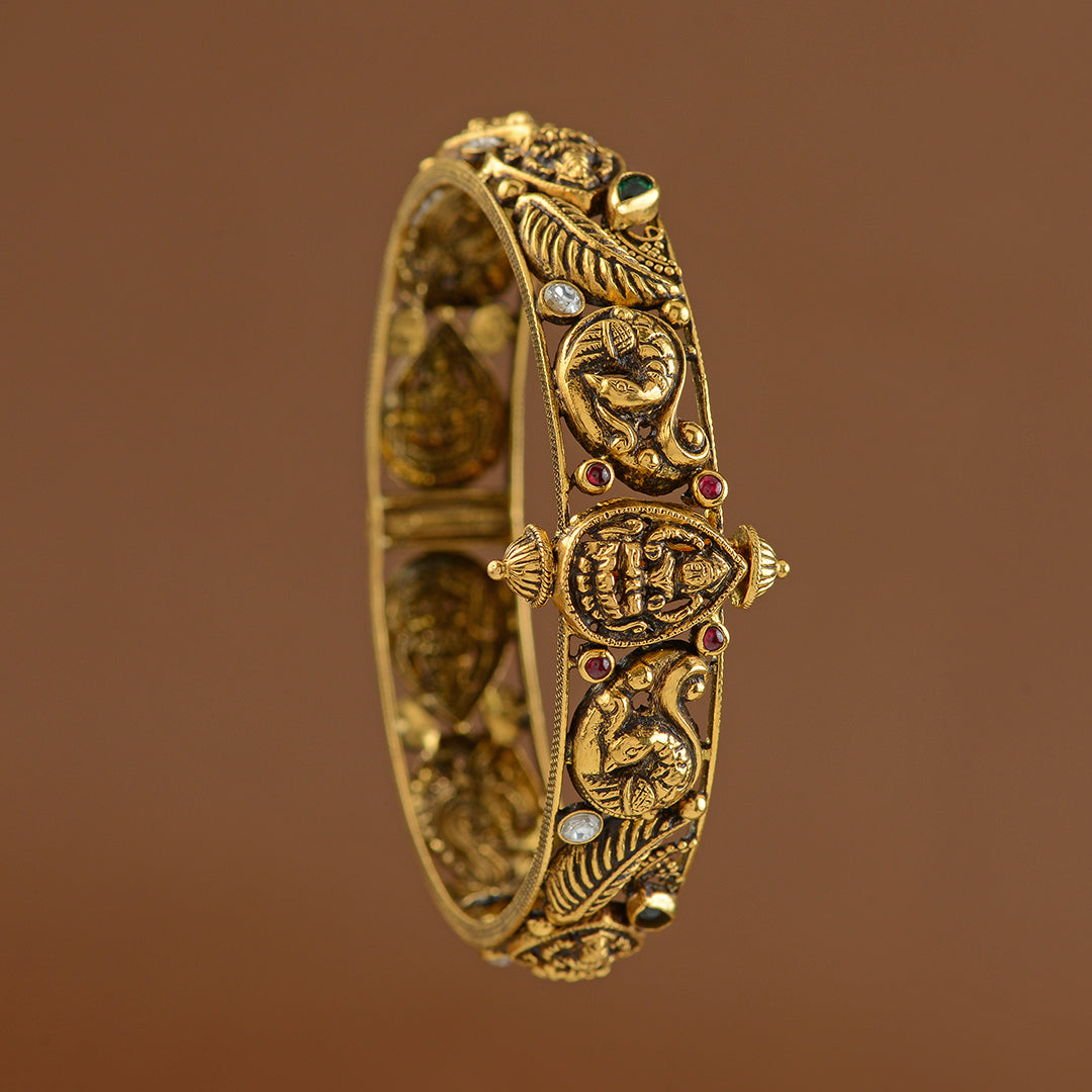 Antique Gold Bangles With Lakshmi And Peacock Motif