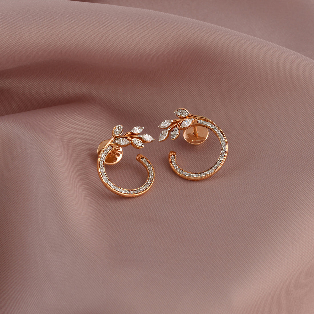 Diamond stud Earrings in Leaf Motif - Krishna Jewellers Pearls and Gems