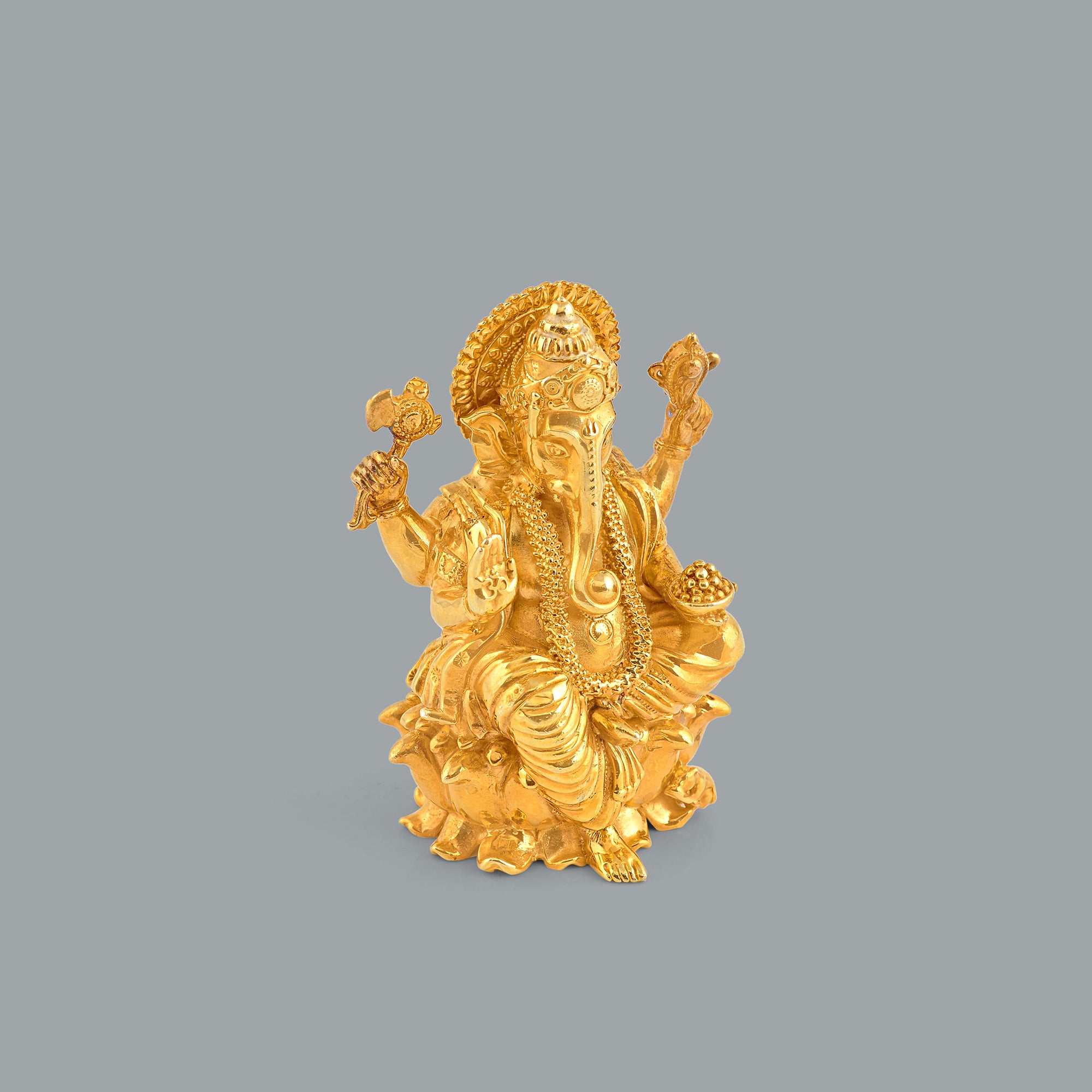 Silver Ganesh Idol in Golden Elegance