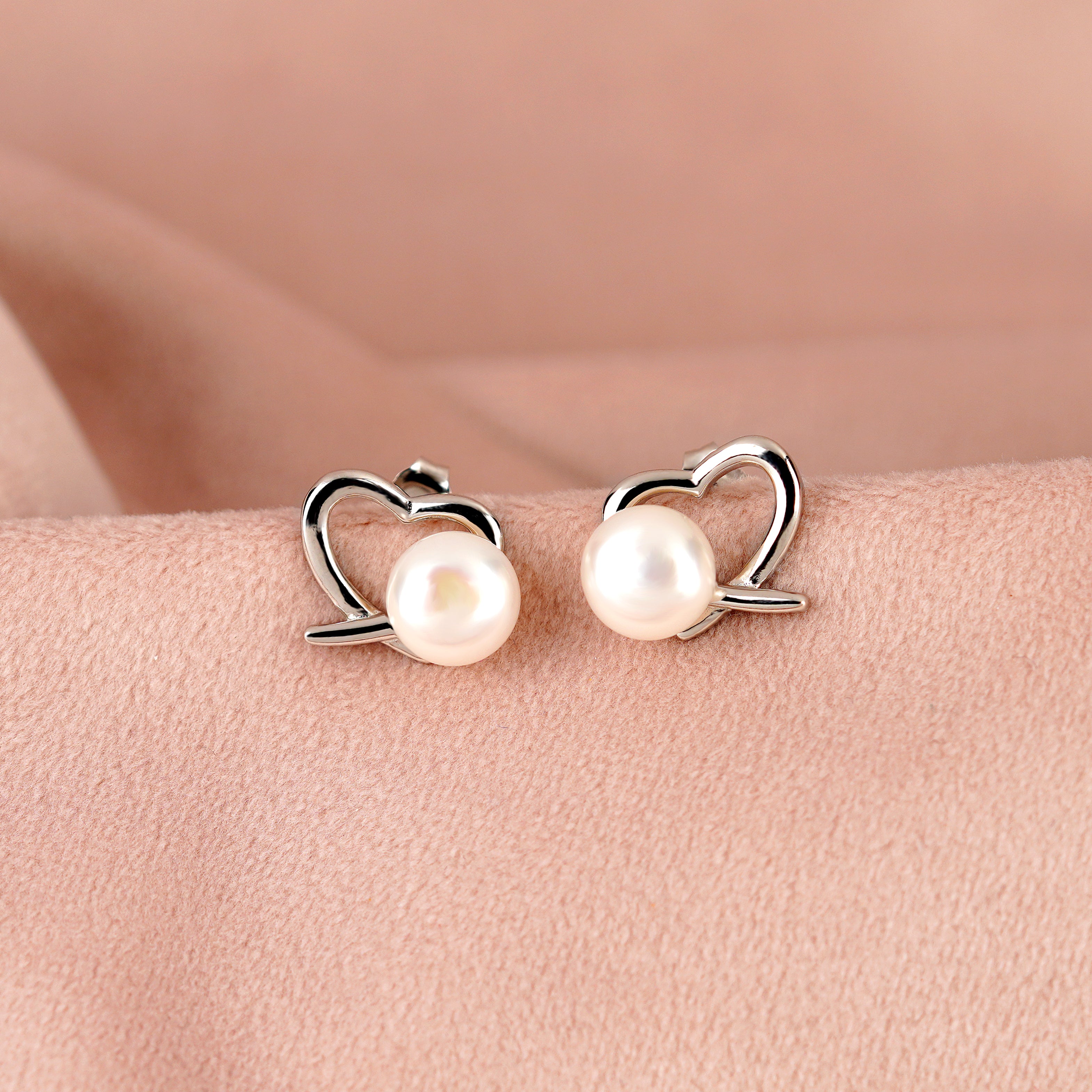 Heartfelt Pearl stud Earrings in Silver Alloy