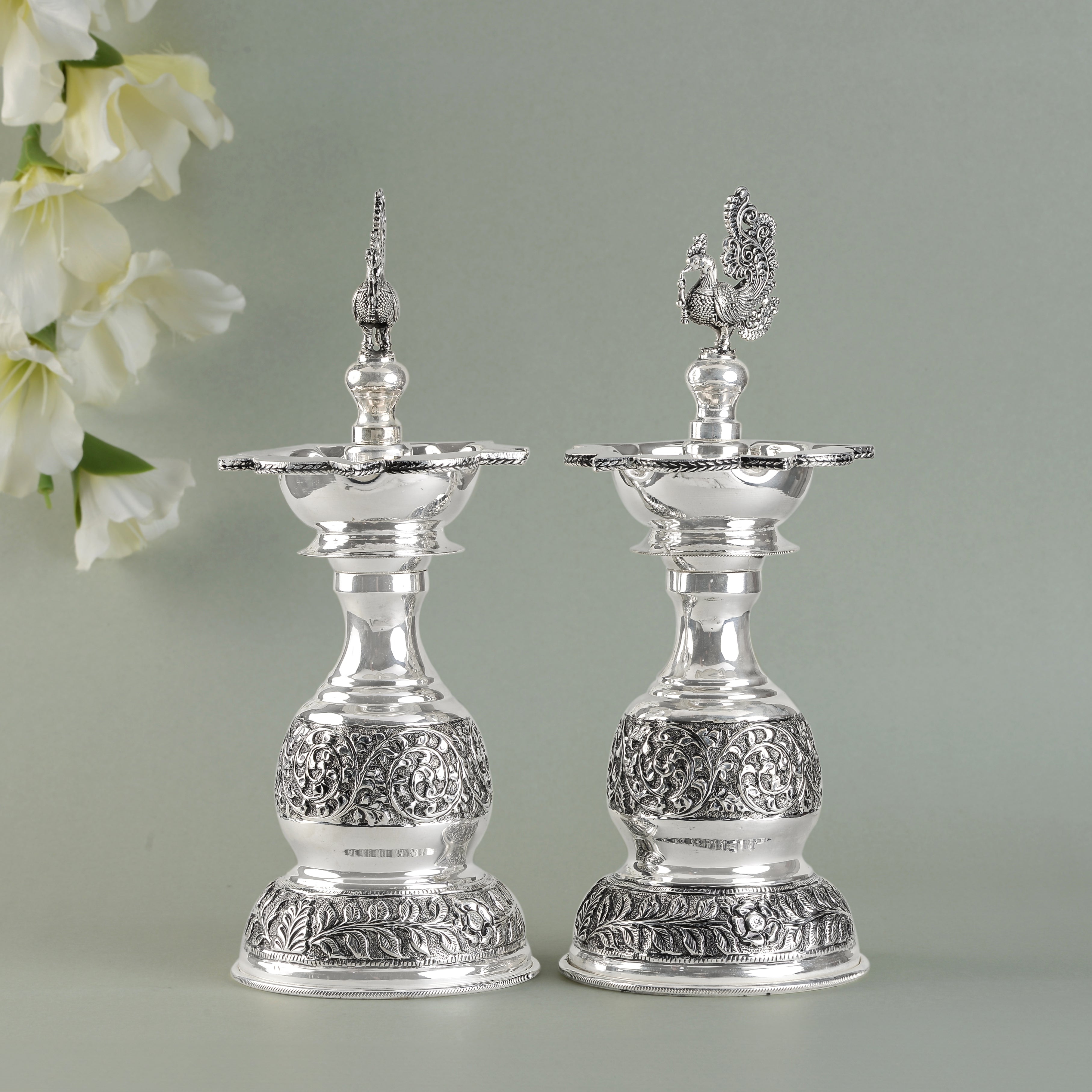 Silver Peacock Deepam with Nakshi Elegance