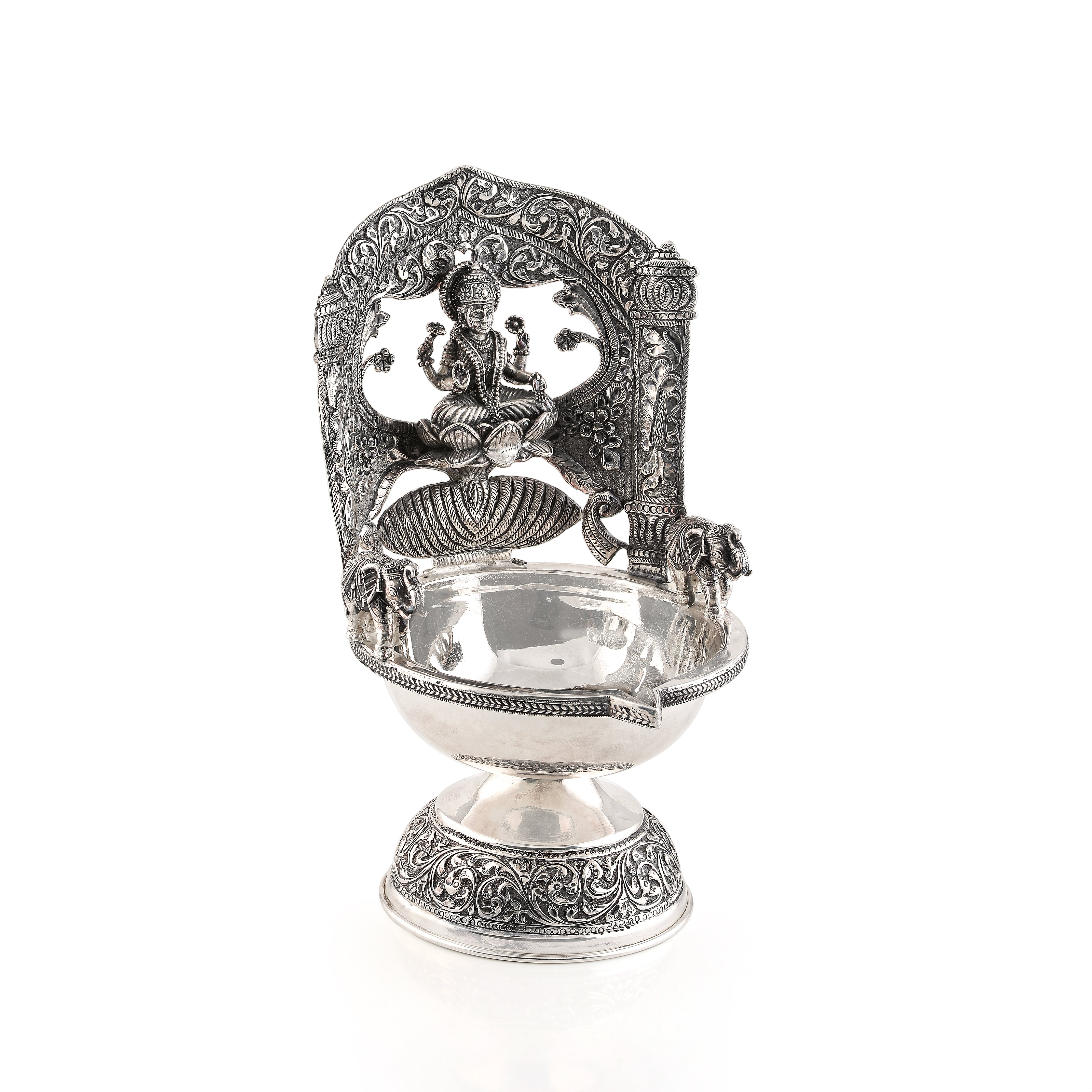 Lakshmi devi floral silver diya.