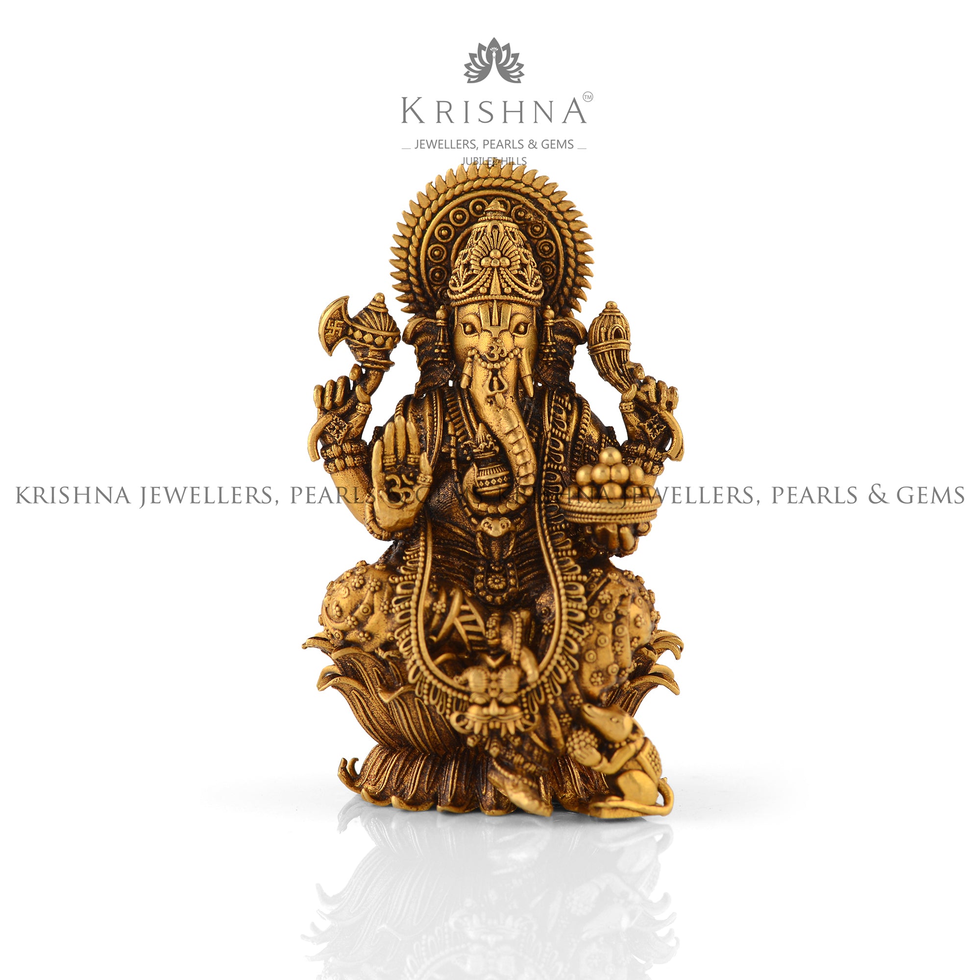 Divine Ganesha Idol In Pure Gold