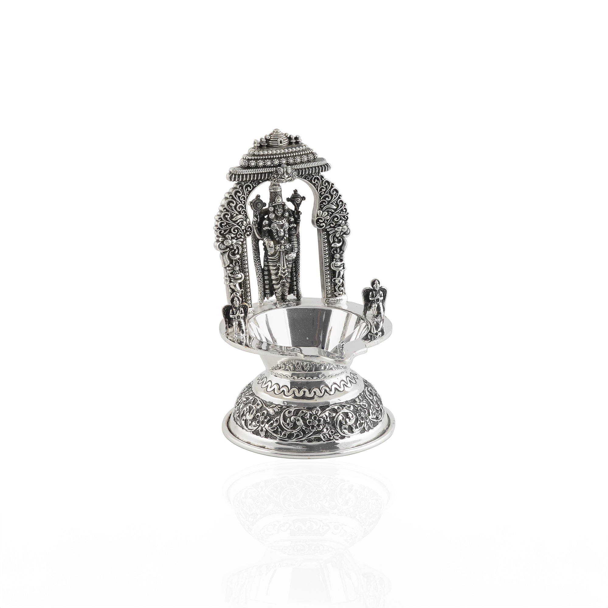 Divine glow from silver lord venkateshwara diya