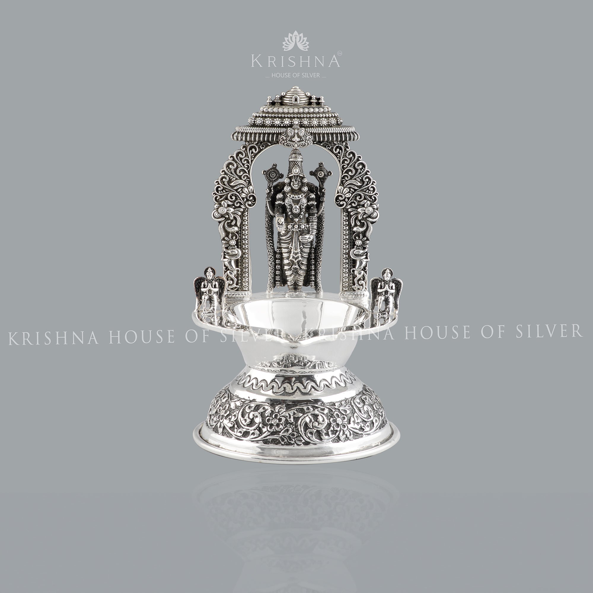 Divine glow from silver lord venkateshwara diya