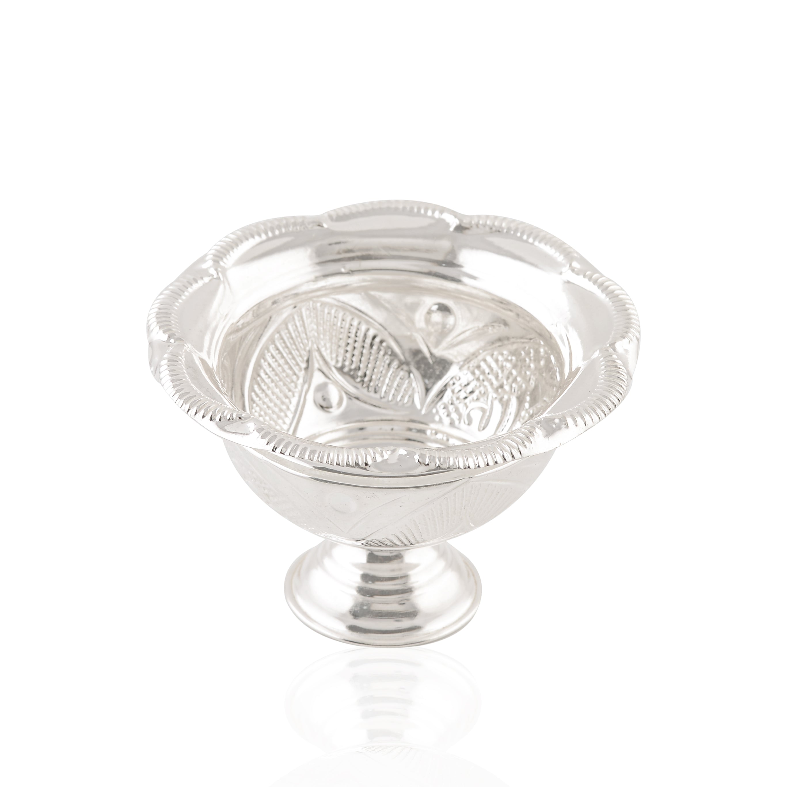 Silver bowls with flower petal motifs.