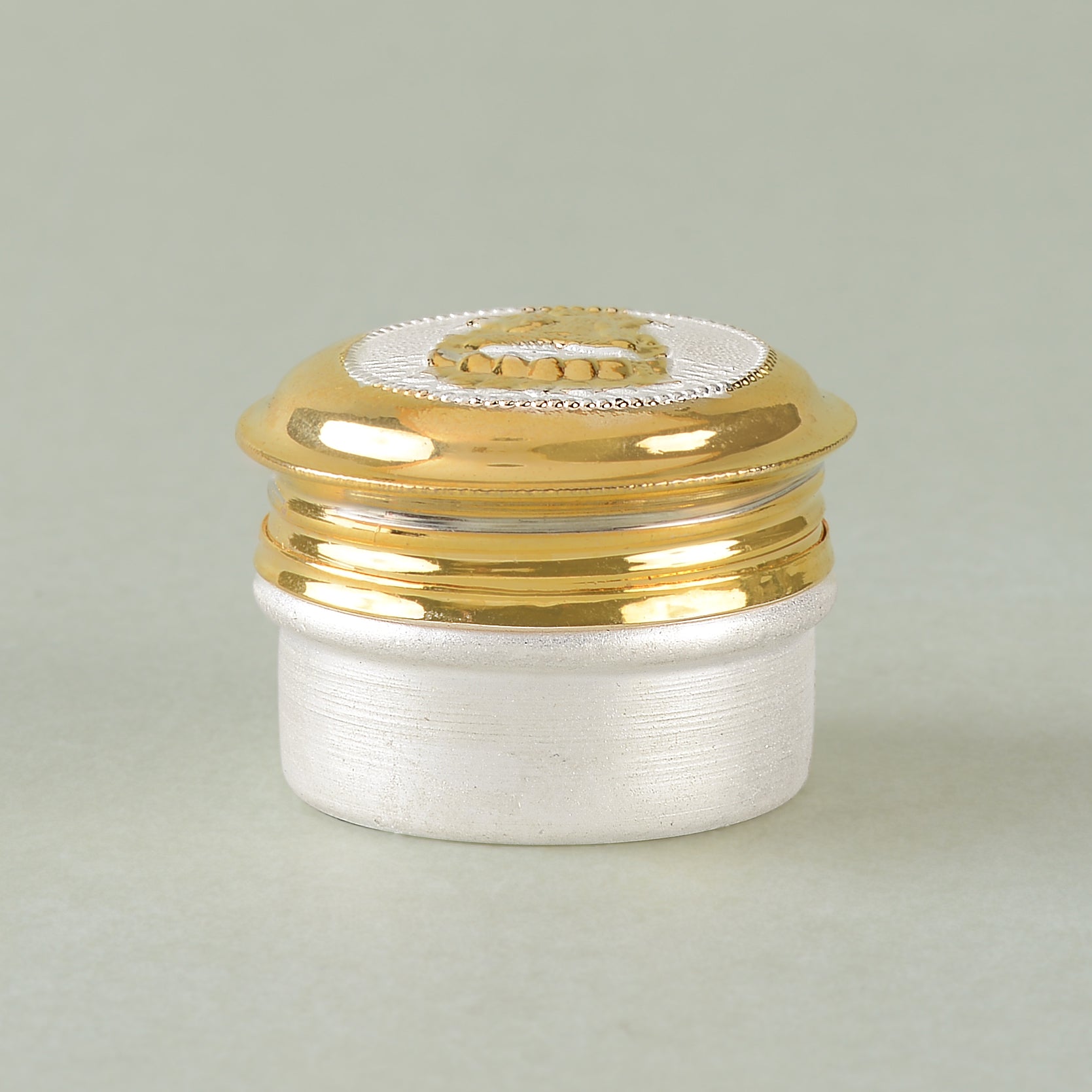 Silver Laxmi Devi-Themed Kumkum Box with Gold Finish