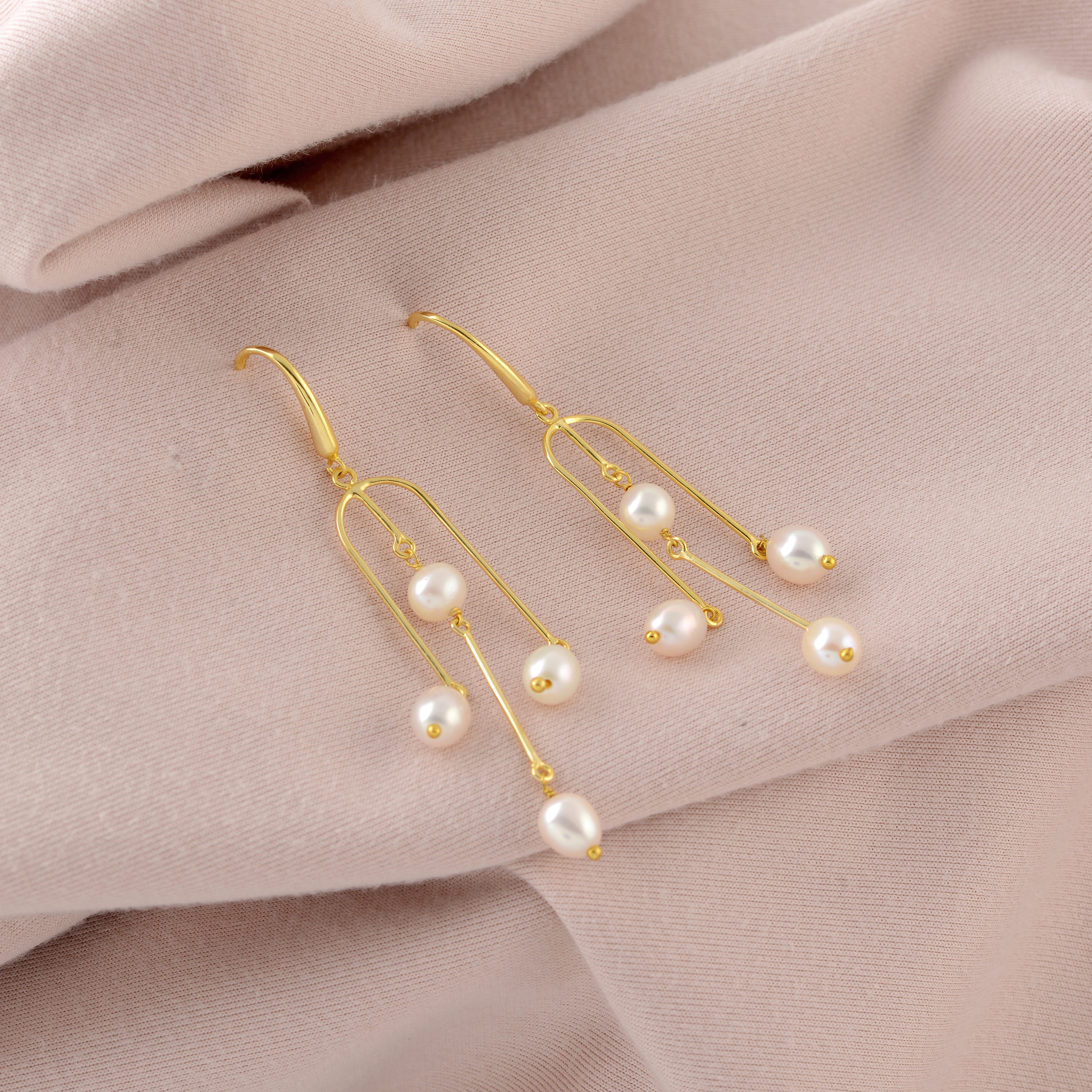 Trendy Yellow Gold Hanging Pearl Earrings