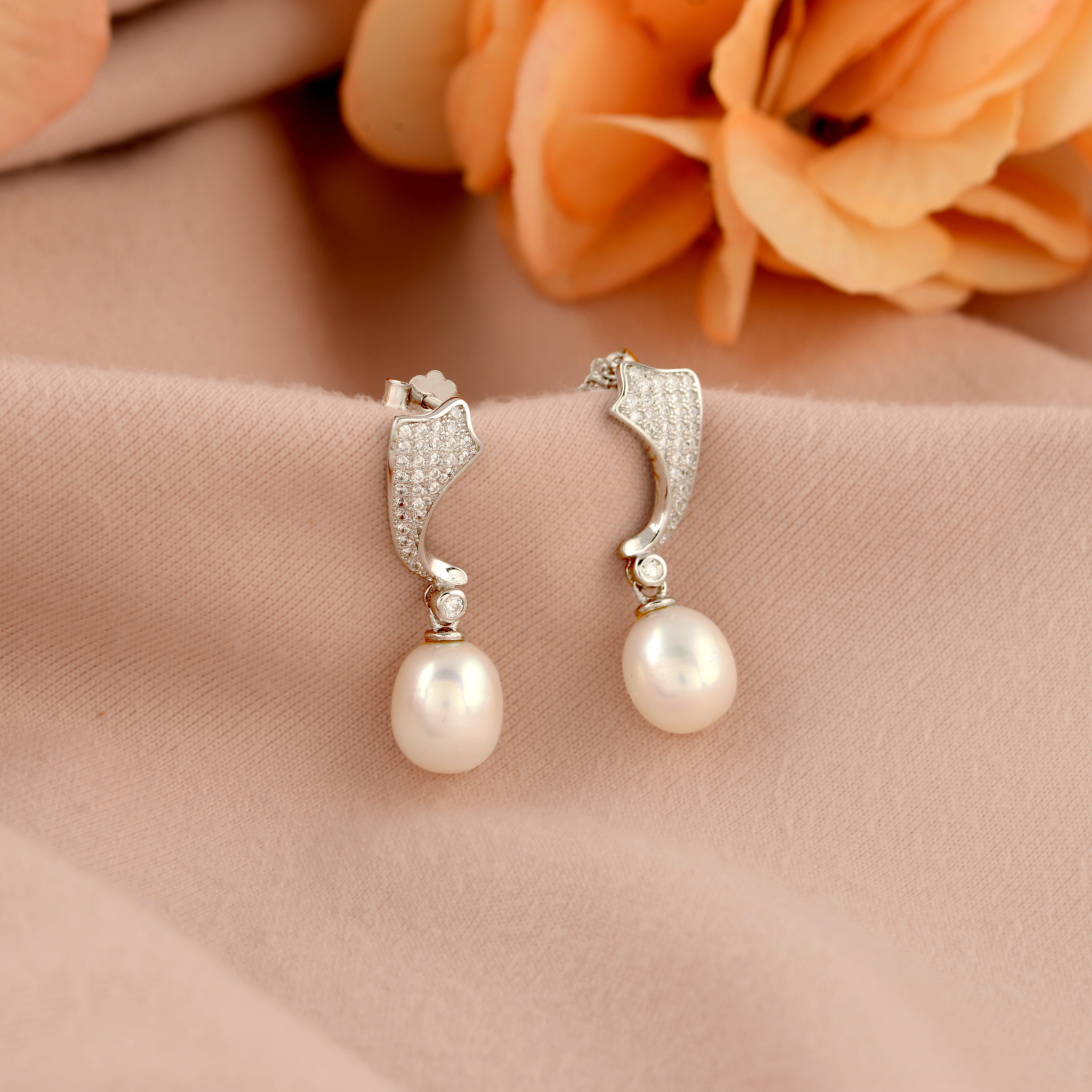 J bali earrings with elegant freshwater pearls.