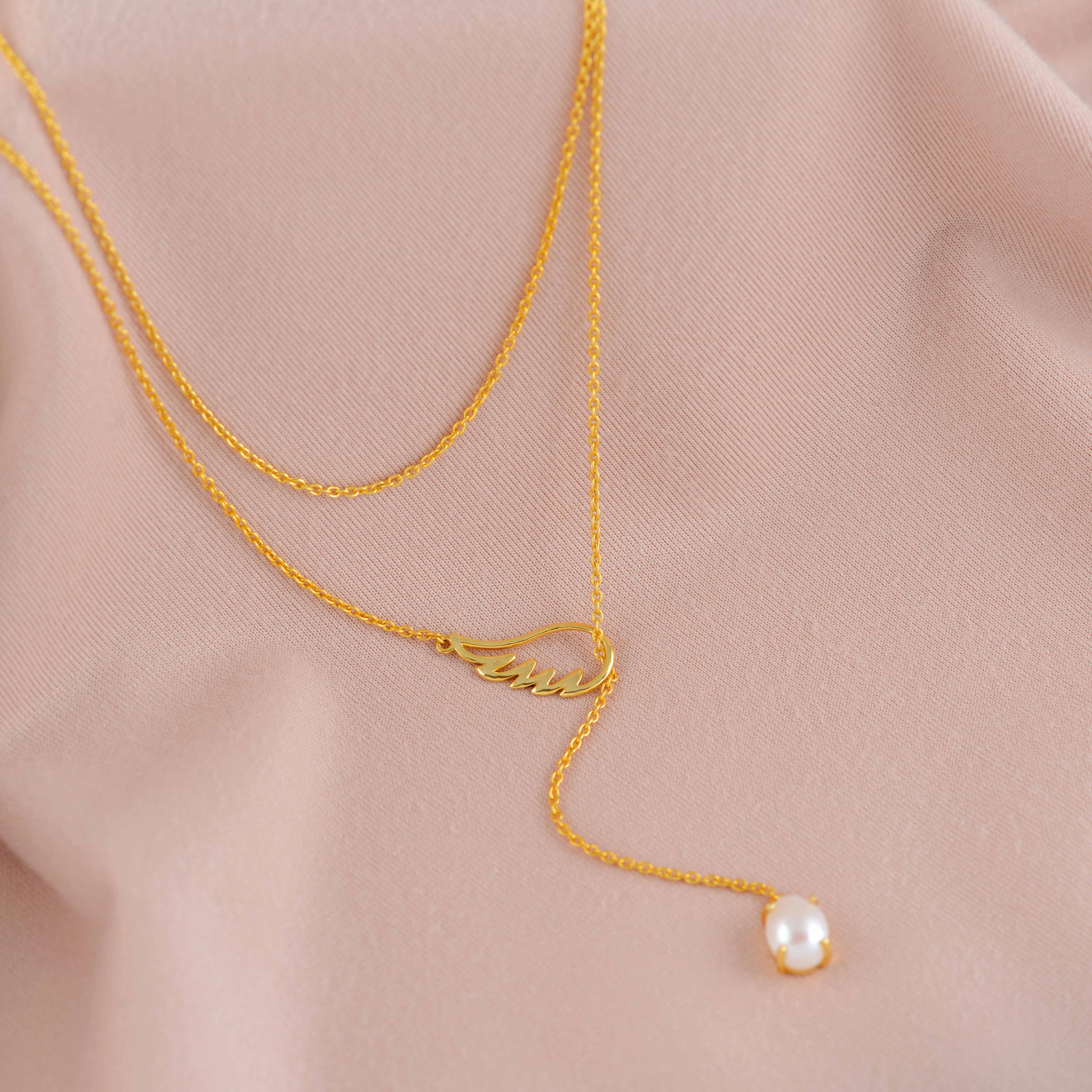 Shattered Serenity: Ethereal Elegance In Broken Angel Pearl Drop Necklace