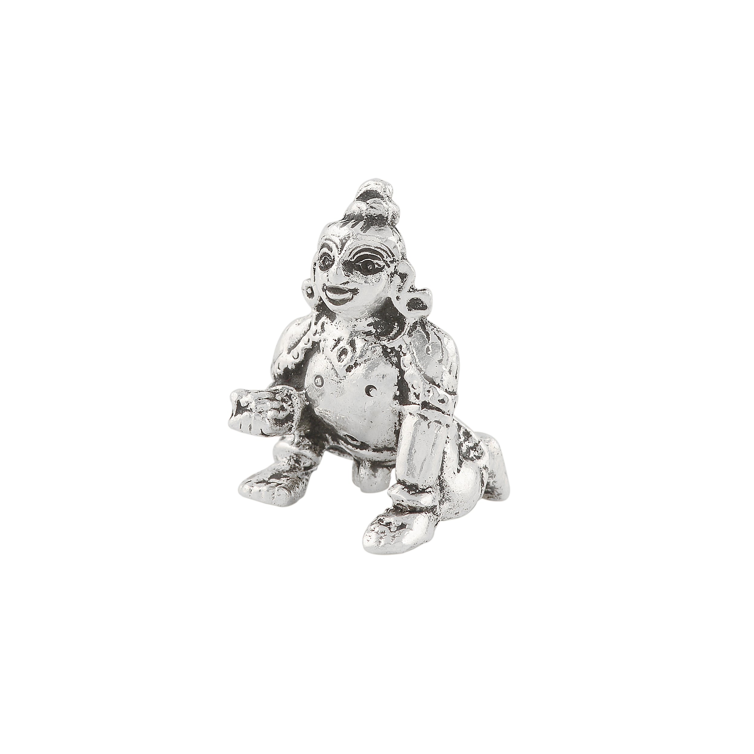 Silver lord Gopal Krishna embodies innocent delight.