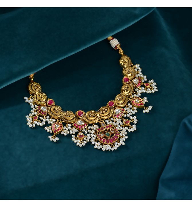 Gold Pearl Necklace in Conch Motif