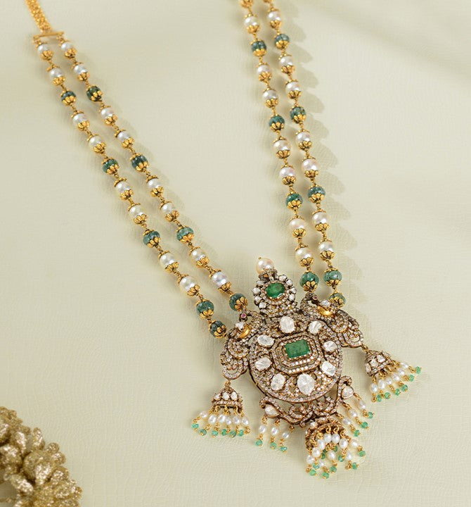 Gold Pearl String with Antique Pendant