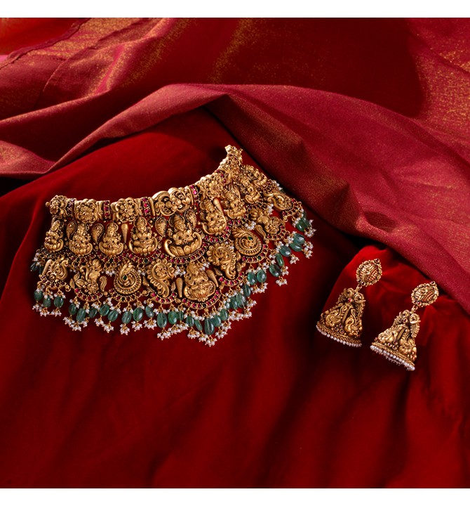 Indian bridal gold necklace sets in Nakshi Work with Guttapusalu