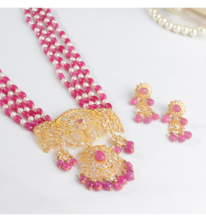 Indian gold pearl necklace sets in Floral Motif