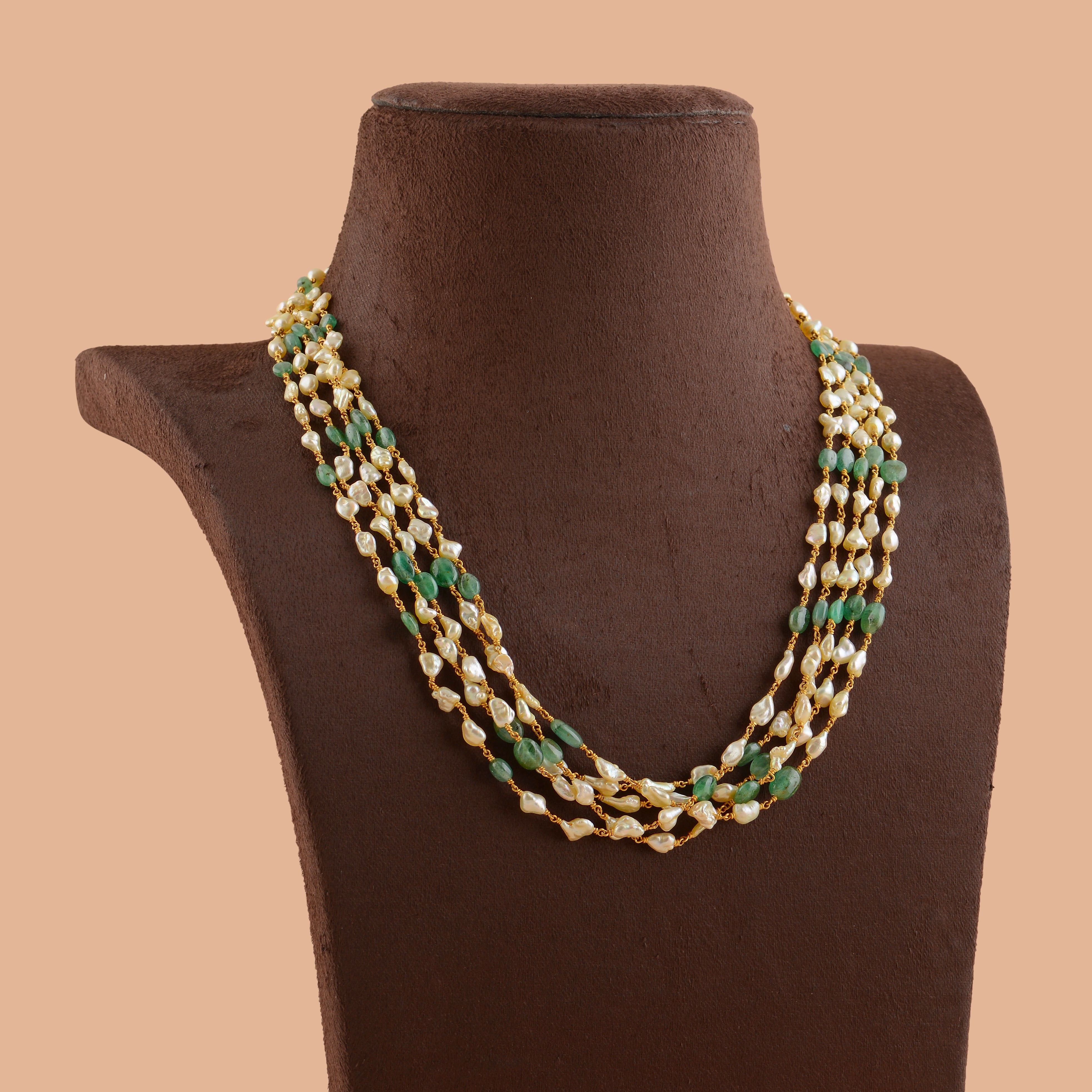 Multiline Pearl and Emerald Necklace in Gold