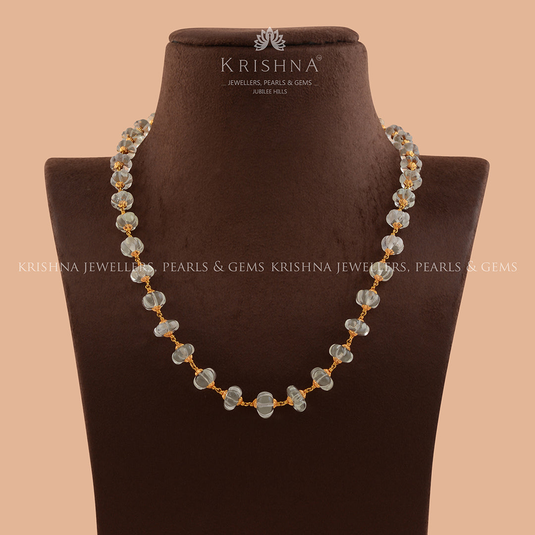 This Gold Pearl Necklace