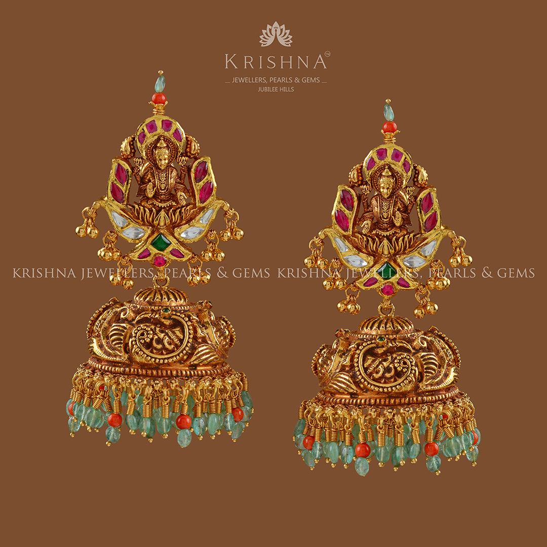 Gold Jhumka  Earrings in Lakshmi Motif